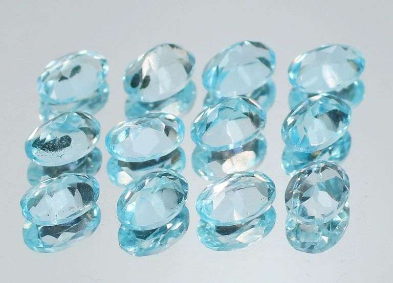 Matched! 12 piece 11.68ct full fire sky blue Topaz set