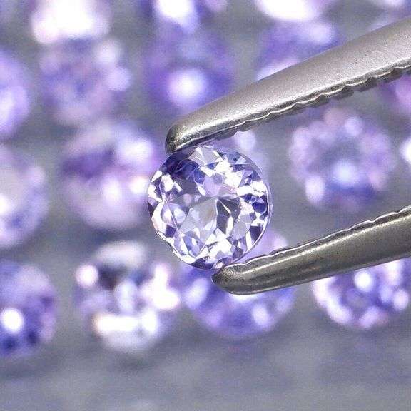 Stunning 3.28ct diamond cut Tanzanite set