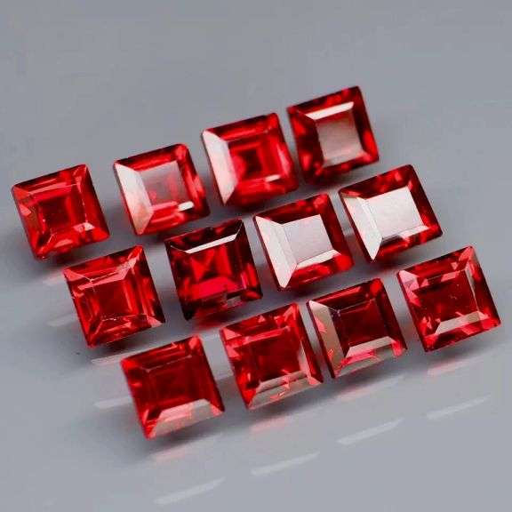 Stunning 6.42ct square cut cherry red Garnet set