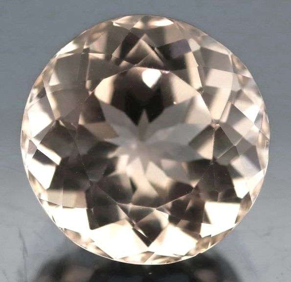 Untreated 12.13ct 14mm champagne Topaz
