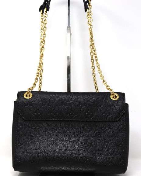 Louis Vuitton Vavian PM Monogram Emprinte leather handbag
