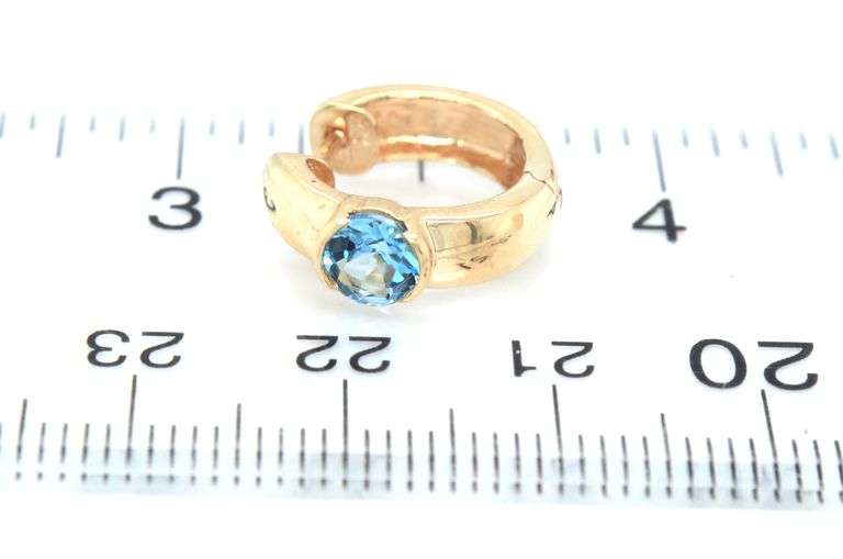 10kt Yellow gold blue topaz bezel set hoop earrings