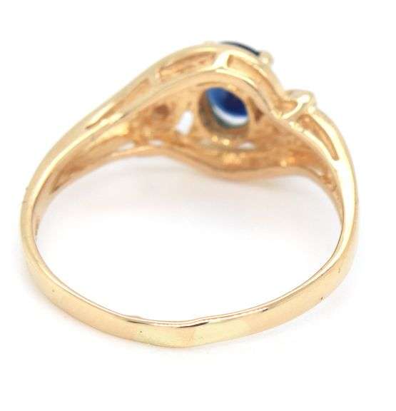 14kt Yellow gold blue sapphire and diamond accent ring