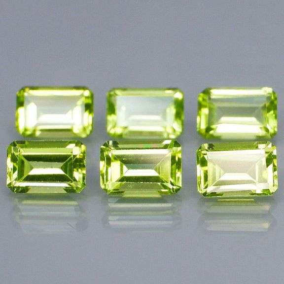 Brilliant 3.92ct 6pc set of matched emerald cut Peridot
