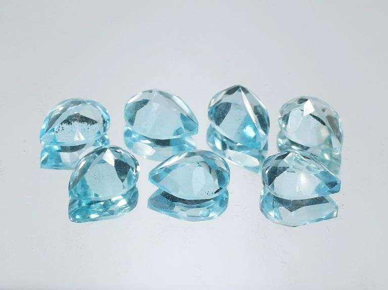 7 piece 14.15ct glittering sky blue Topaz set
