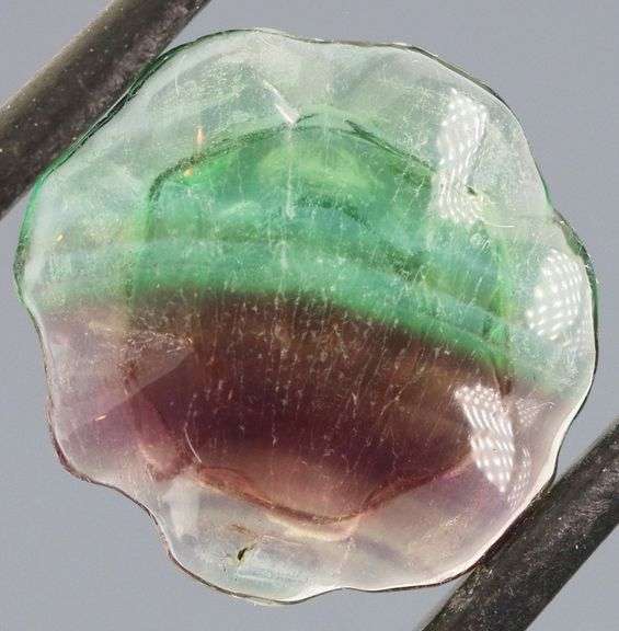 Glowing! 5.74ct Bi-color Fluorite carving