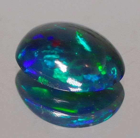 Magnificent 1.24ct blue and green flashing Black Opal
