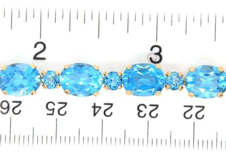 14kt Yellow gold oval blue topaz link bracelet