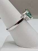 Sparkling 2.25 Ct VVs1 Trillion Cut Emerald Green Moissanite Ring