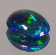Magnificent 1.24ct blue and green flashing Black Opal