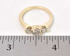 Glimmering 14K Yellow Gold Three Diamond Ring