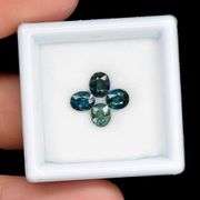 Heated only! 1.47ct blue green Sapphire set