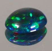 Magnificent 1.24ct blue and green flashing Black Opal