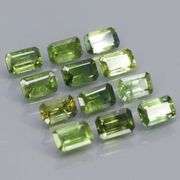 Excellent 4.64ct emerald cut Australian Sapphire set