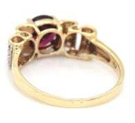 Garnet and diamond scalloped ring in yellow gold
