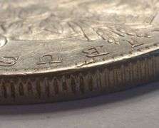 1880-O Morgan Silver Dollar Lamination Error