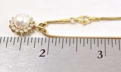 Elegant 18K Yellow Gold Pearl and Diamond Pendant Necklace