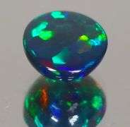 Magnificent 1.24ct blue and green flashing Black Opal
