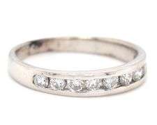 Platinum channel set diamond band