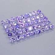 Stunning 3.28ct diamond cut Tanzanite set