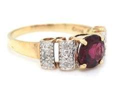 Garnet and diamond scalloped ring in yellow gold