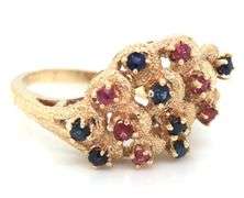 14kt Yellow gold Ruby and sapphire cluster ring