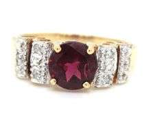 Garnet and diamond scalloped ring in yellow gold
