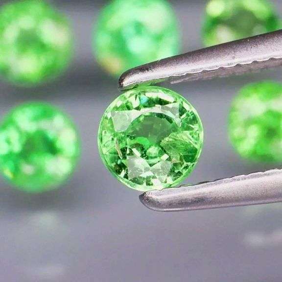 Tremendous 2.06ct untreated spring green Tsavorite set