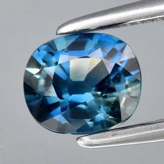 Unbelievable .79ct VS blue green Sapphire