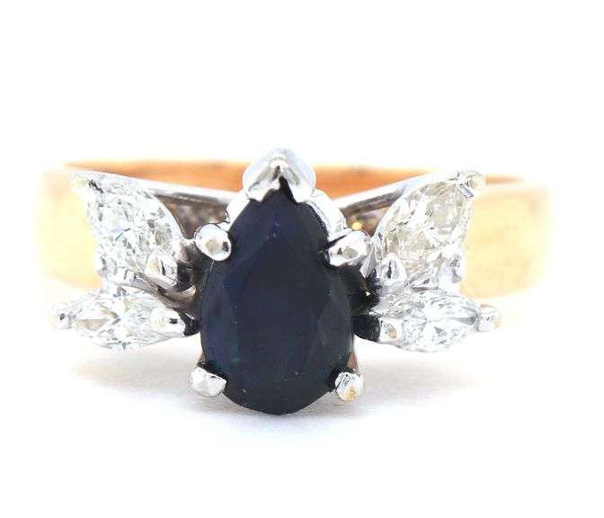 18kt Yellow gold pear shaped sapphire and marquise diamond ring