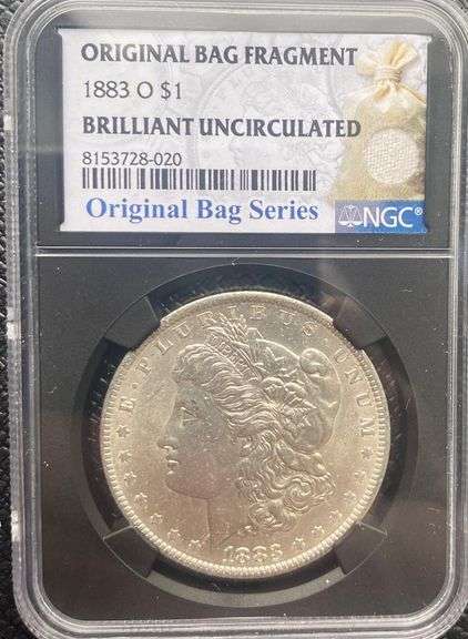1883 O Brilliant Uncirculated  Morgan $ NGC With Original Bag Fragment