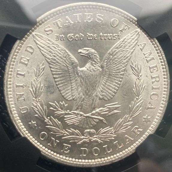 1896 NGC Brilliant Uncirculated Morgan $ With Original Bag Fragment.