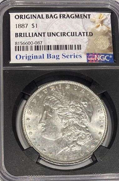 1887 NGC Brilliant Uncirculated Morgan $ With Original Bag Fragment.