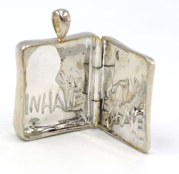 Group lot of 4 925 sterling silver signed pendants