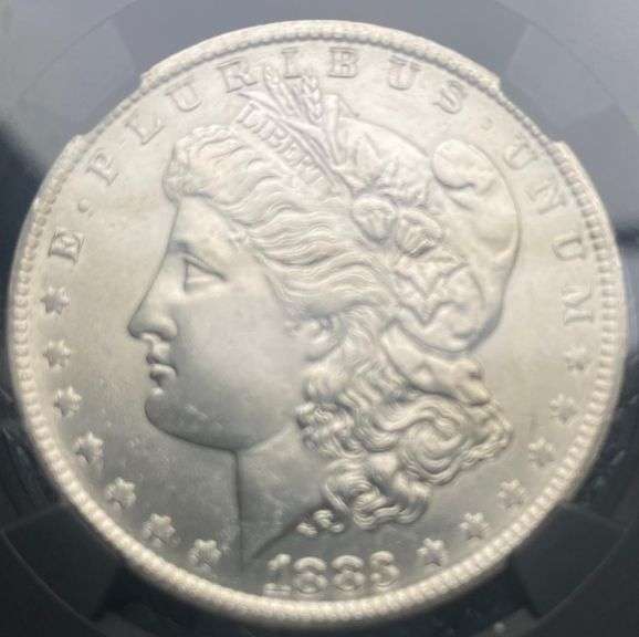 1883 O Brilliant Uncirculated  Morgan $ NGC With Original Bag Fragment