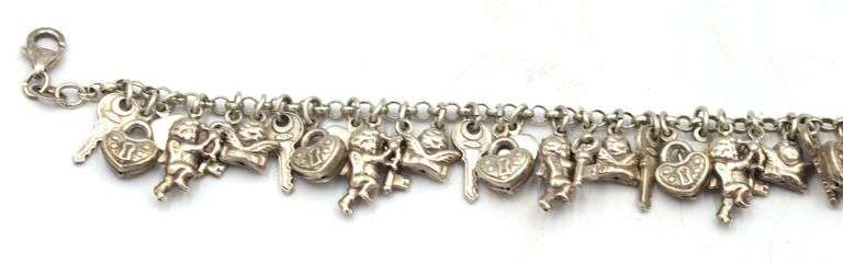 Vintage 925 sterling silver bracelet with charms
