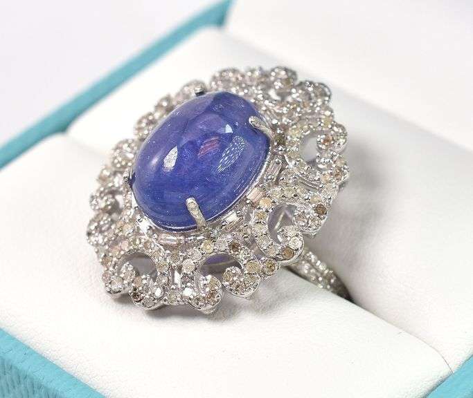 Fantastic 8.25CTS Oval Shaped Cabochon-Cut Tanzanite & 1.08CTW Diamond Ring in Sterling Silver