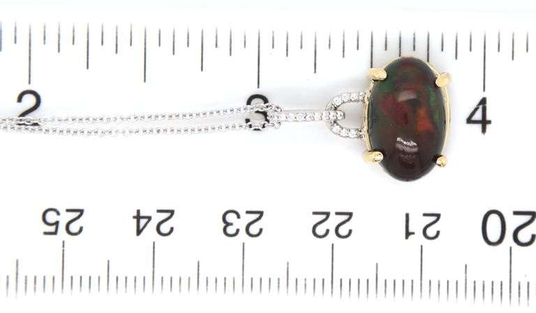 14kt White gold 3.74ct Black opal and diamond pendant on chain