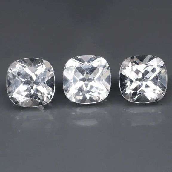 Superb 7.64ct high fire 8mm diamond white Topaz set