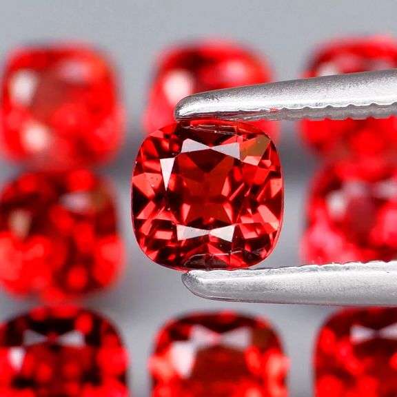 Nice 5.11ct cushion cut cherry red Garnet set