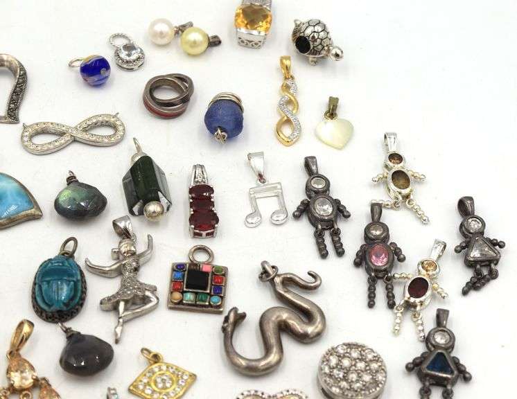 Group lot of vintage 925 sterling silver pendants and charms