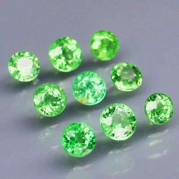 Tremendous 2.06ct untreated spring green Tsavorite set
