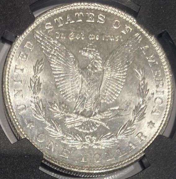 1887 NGC Brilliant Uncirculated Morgan $ With Original Bag Fragment