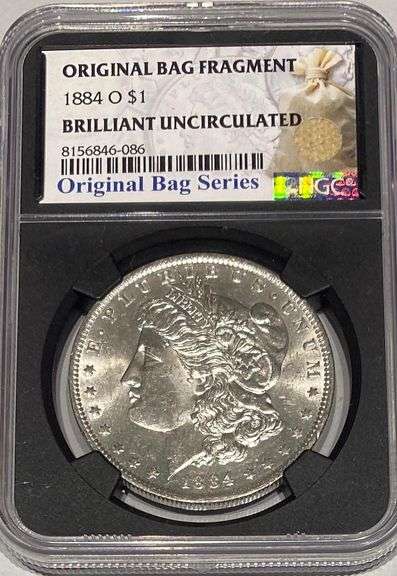 1884 O Brilliant Uncirculated Morgan $ NGC With Original Bag Fragment