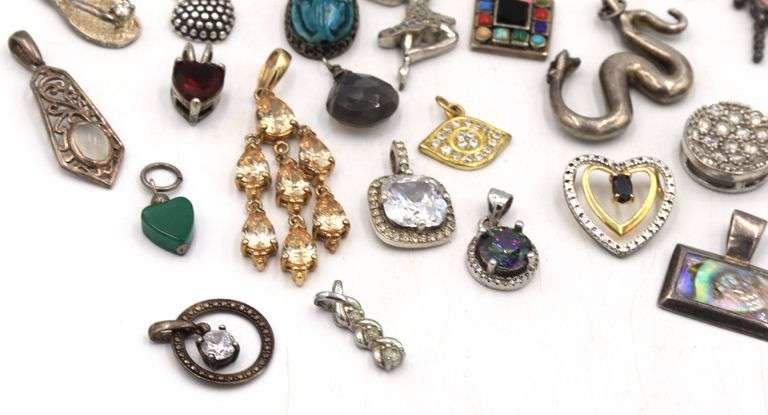 Group lot of vintage 925 sterling silver pendants and charms