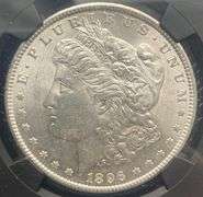 1896 NGC Brilliant Uncirculated Morgan $ With Original Bag Fragment.