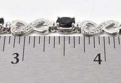 Blue Sapphire and Diamond Infinity Heart Bracelet in Sterling Silver