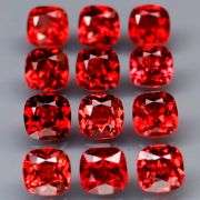 Nice 5.11ct cushion cut cherry red Garnet set
