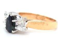 18kt Yellow gold pear shaped sapphire and marquise diamond ring