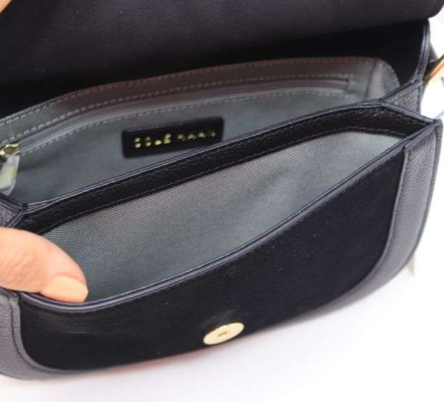 Brand new Cole Haan black leather saddle bag